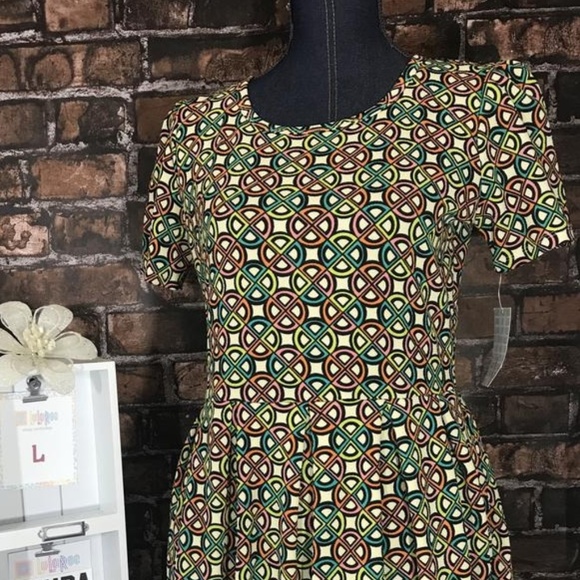 LuLaRoe Dresses & Skirts - LuLaRoe Amelia with pockets Brand new with tag